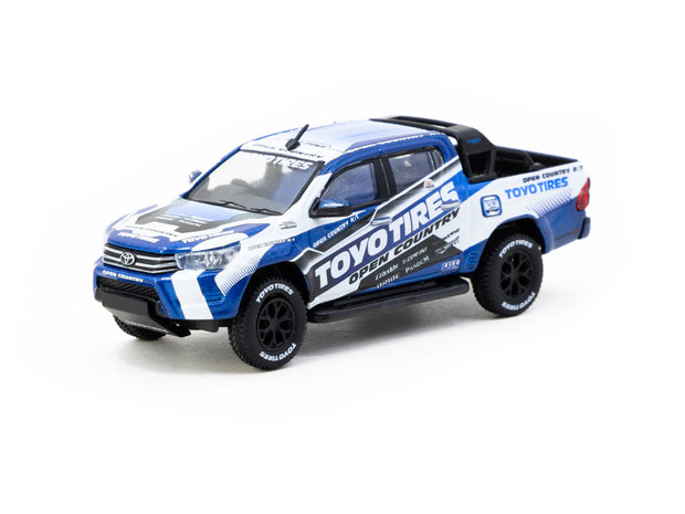 2015 Toyota Hilux Toyo Tires Azul/Blanco 164 Tarmac T64-041-TOYO